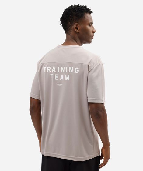 camiseta oversized masculina esportiva estampada cinza