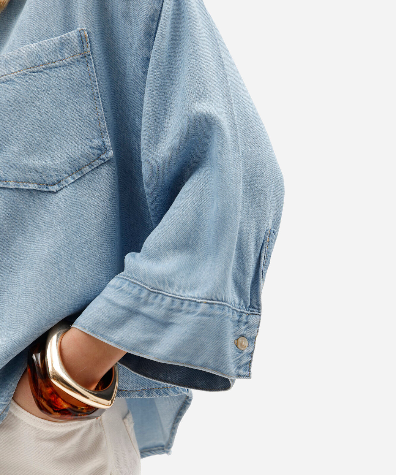camisa feminina jeans manga ampla com bolsos azul