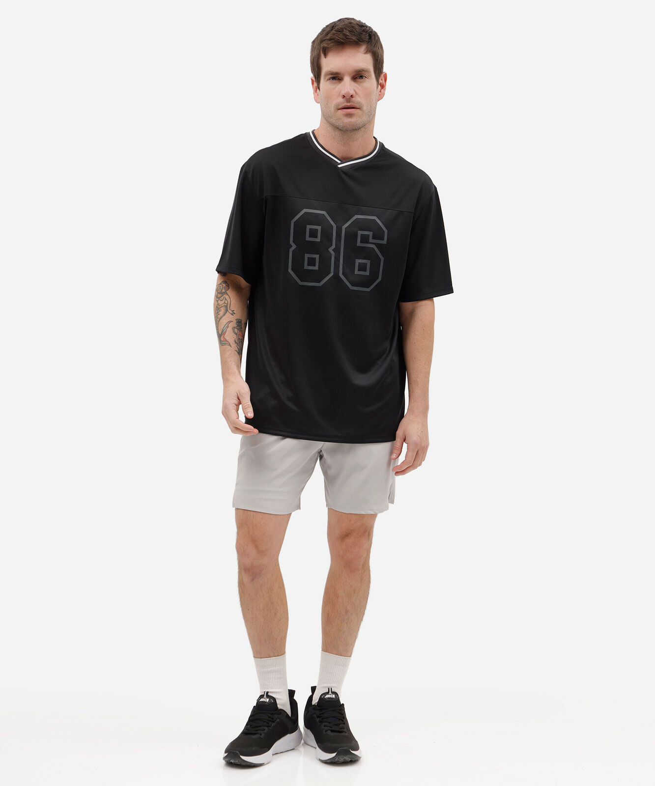 camiseta oversized masculina esportiva estampada preta