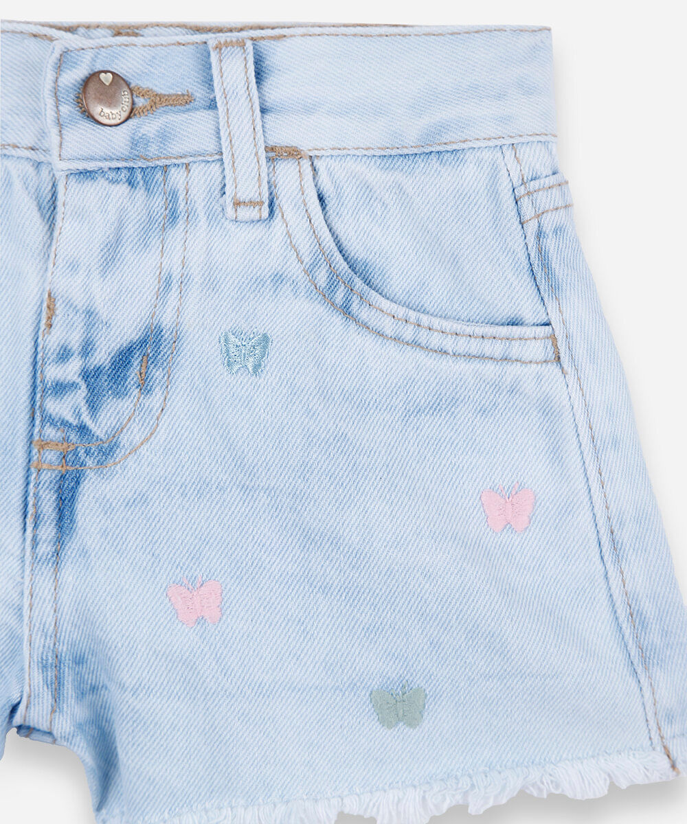 short infantil jeans com bordado de borboleta azul