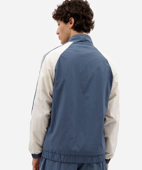 jaqueta corta vento masculina de poliamida esportiva bicolor azul