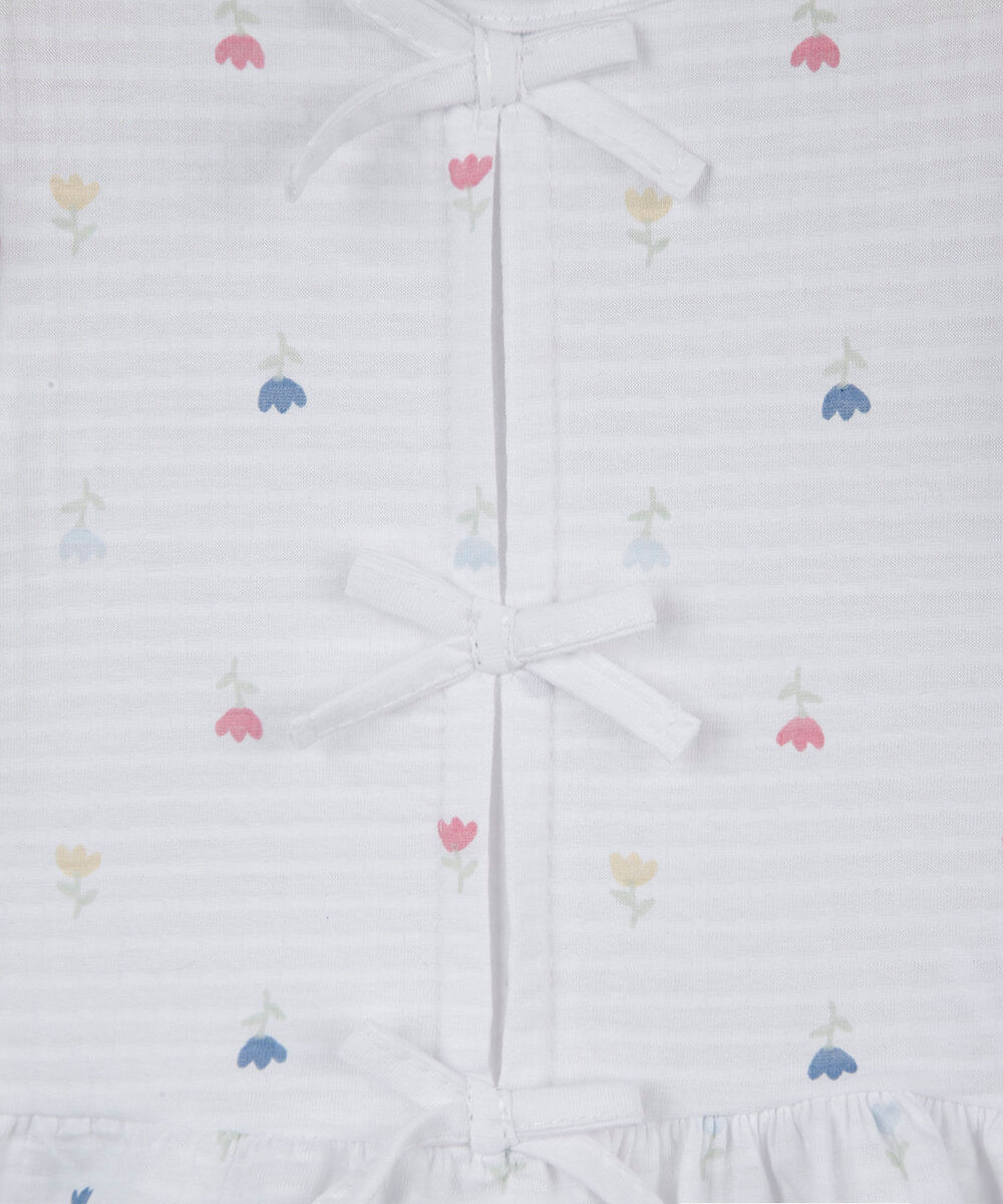 blusa peplum infantil de algodão manga curta com laços texturizada floral off white
