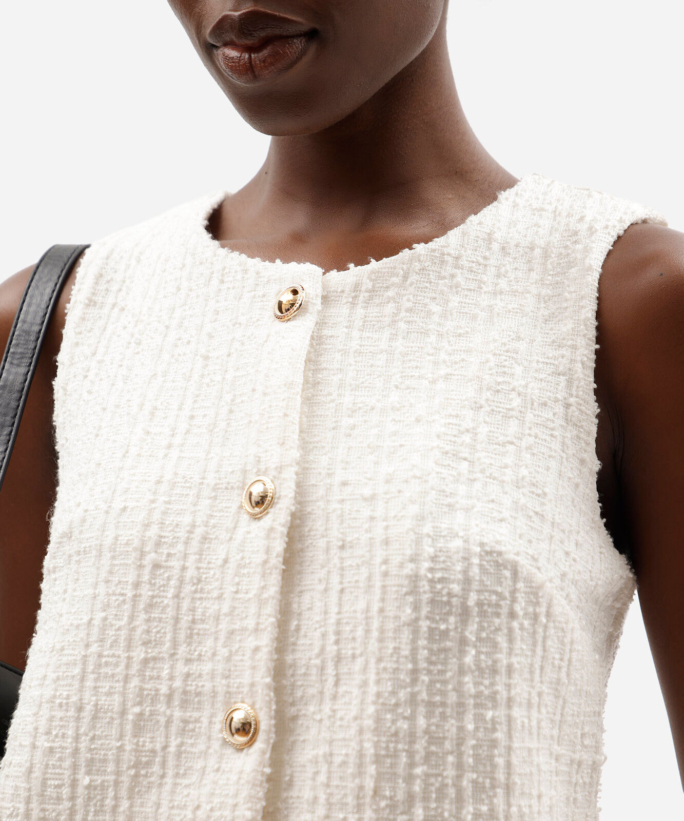 colete feminino de alfaiataria em tweed decote redondo off white