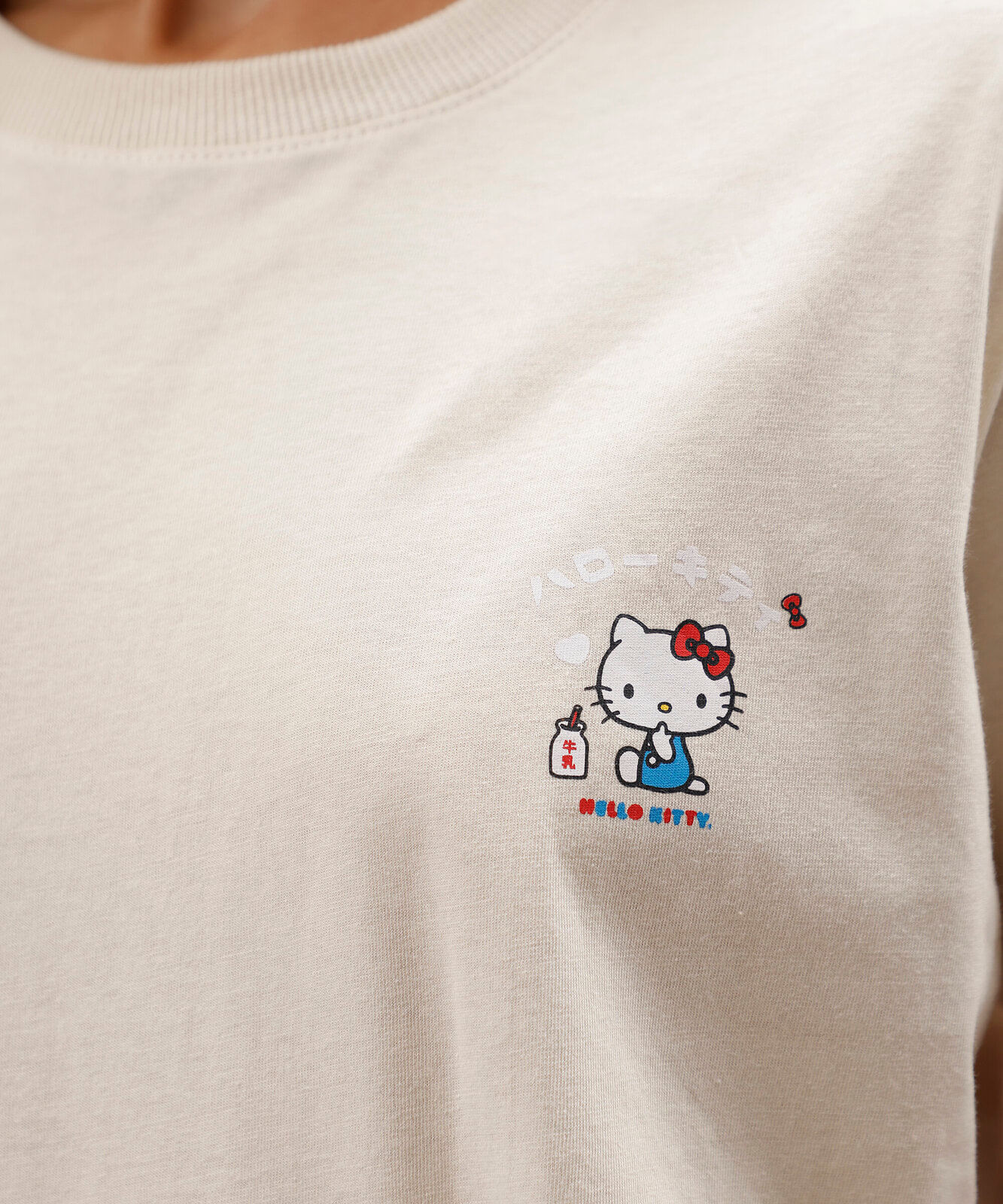 camiseta de Algodão feminina estampada hello kitty off white