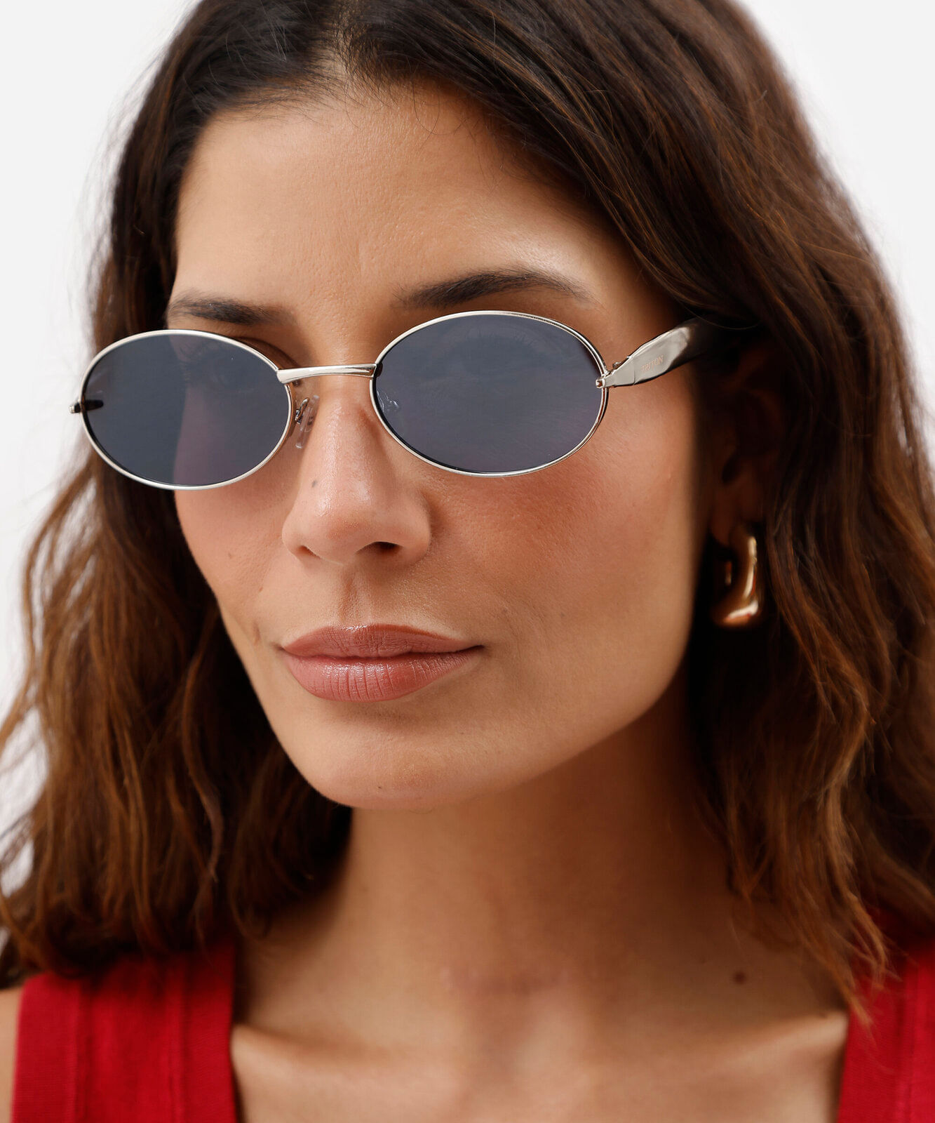 óculos de sol feminino oval de metal triton prata