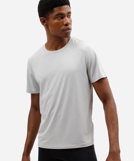 camiseta esportiva masculina de manga curta com detalhe refletivo cinza