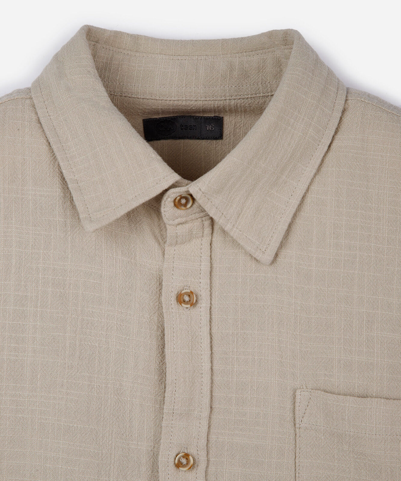 camisa juvenil de algodão com bolso texturizada bege