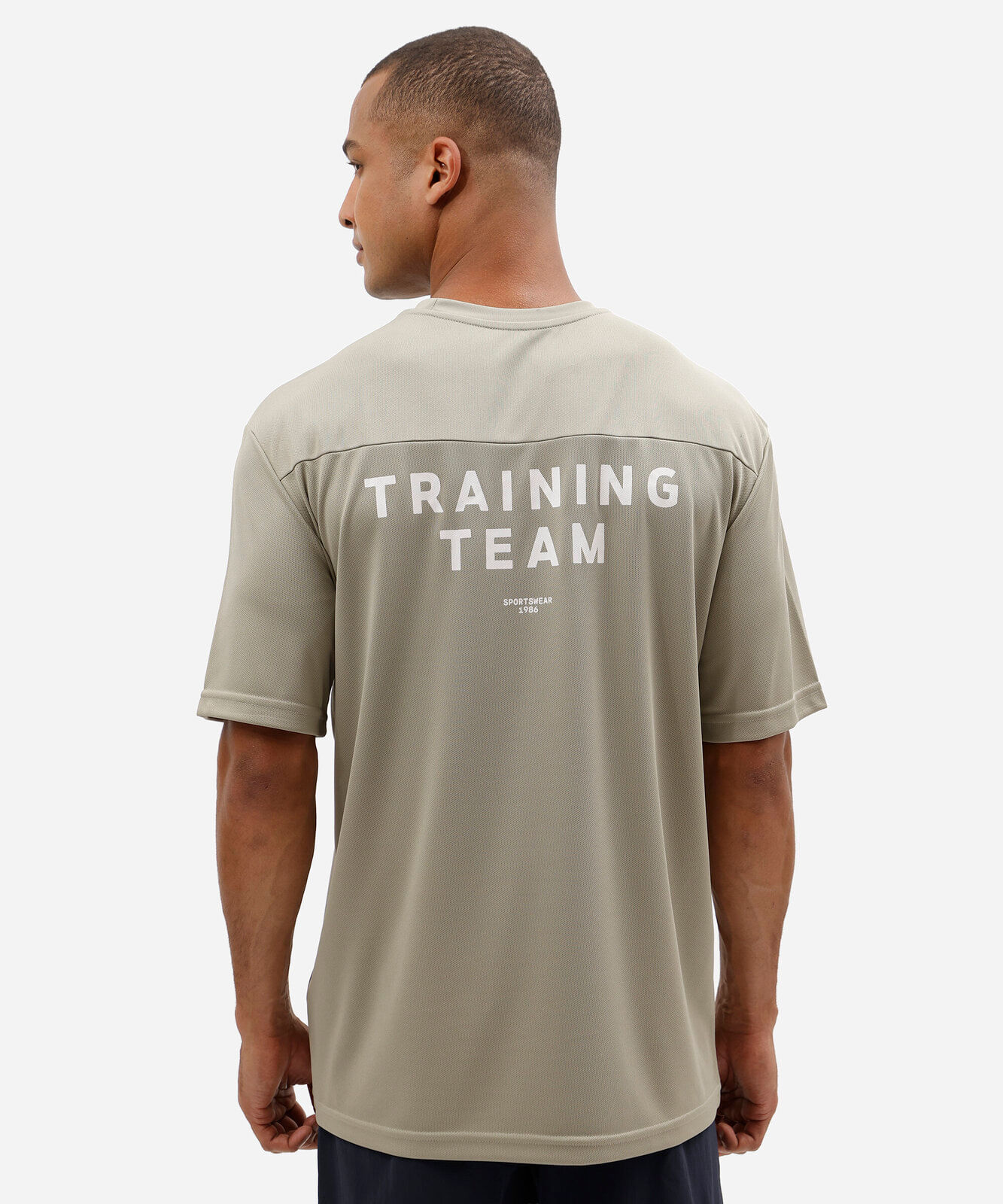 camiseta oversized masculina esportiva estampada verde