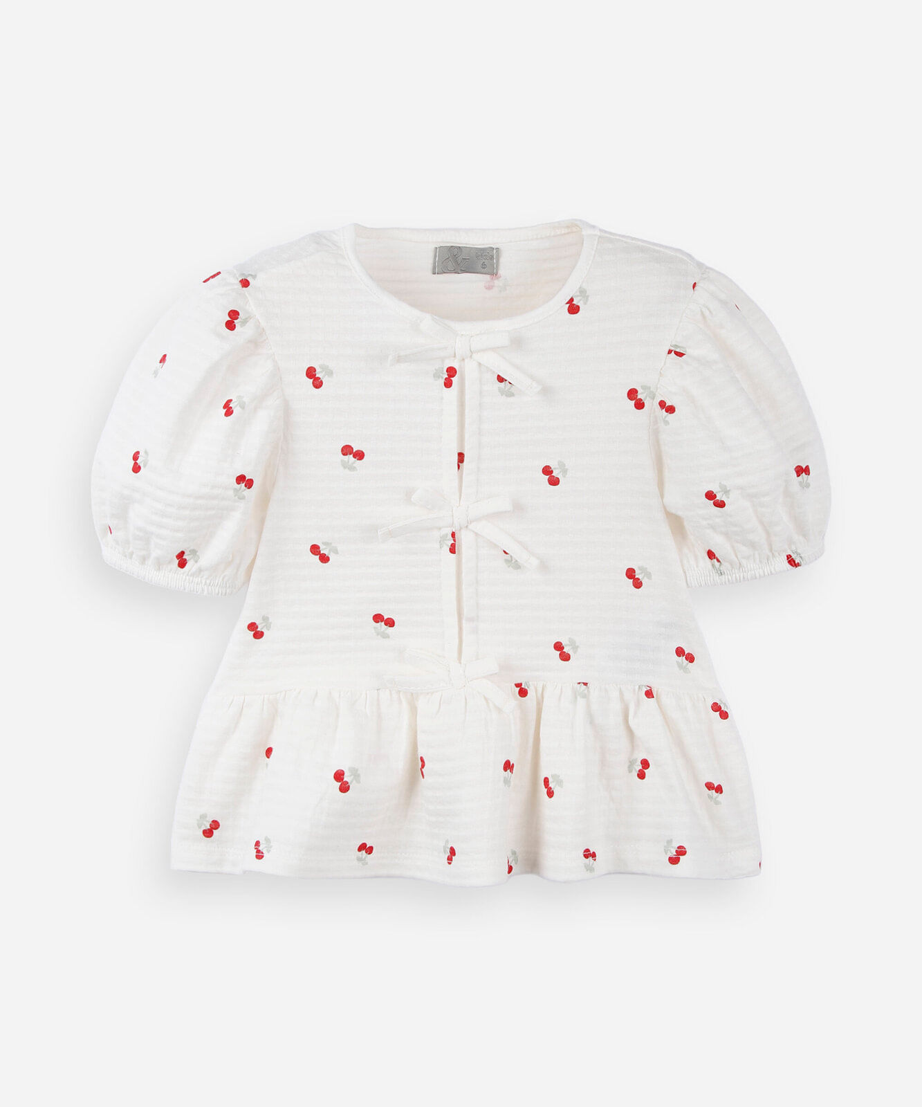 blusa infantil peplum estampada com laços e manga bufante branco